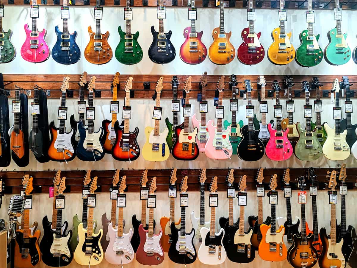 A music shop counter with guitar gear on display