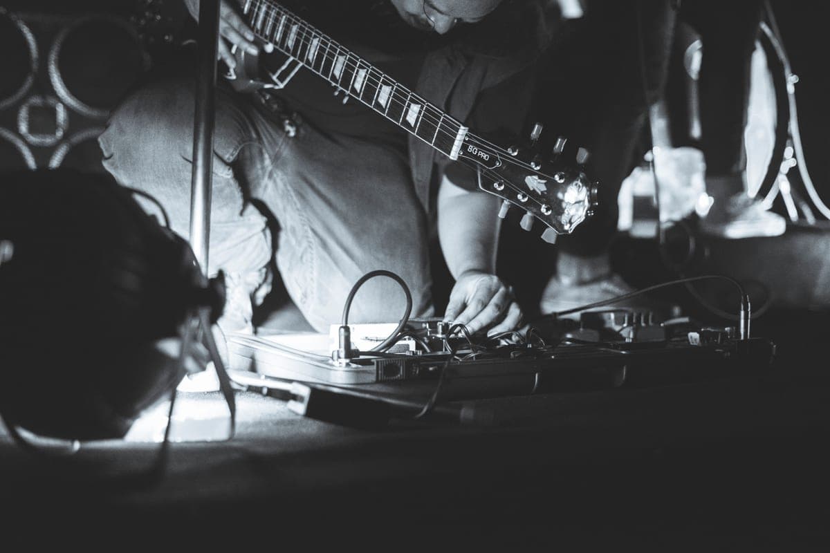 A fuzz pedal at the front of a pedalboard chain