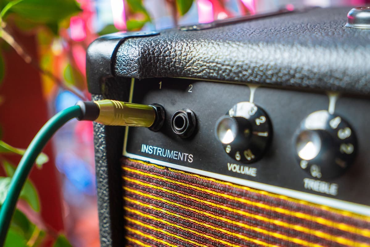 An amplifier control panel with modulation knobs in close focus