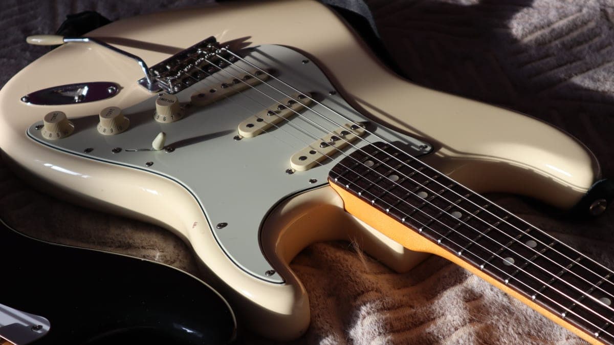 The body and pickups of a solid-body electric guitar