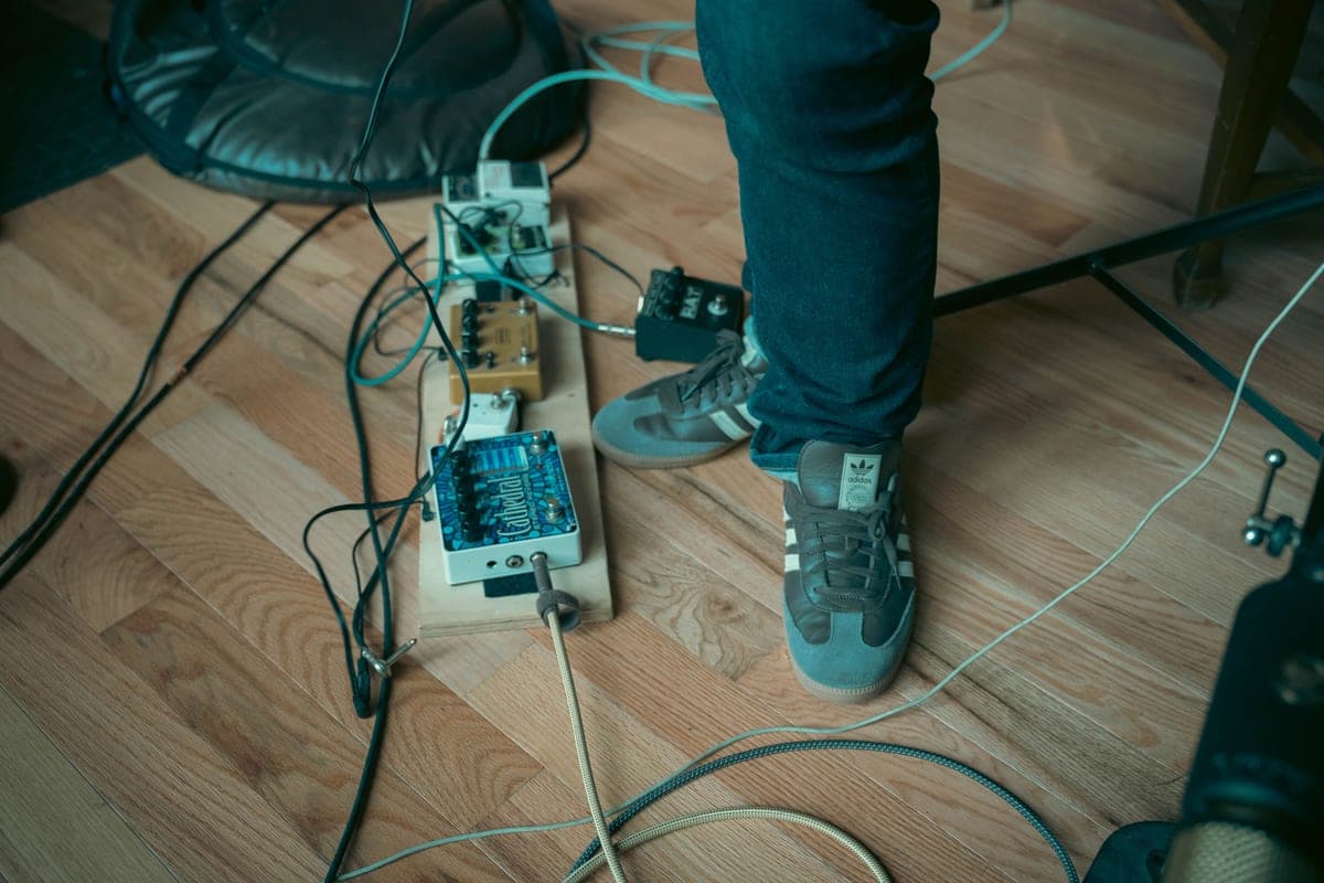 Two green overdrive pedals of different sizes side by side